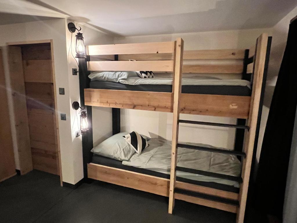 Postel nebo postele na pokoji v ubytování Chalet Charbon