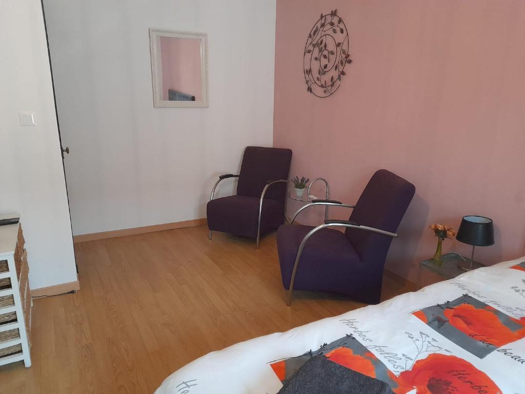 Postel nebo postele na pokoji v ubytování Le Bras d'Or
