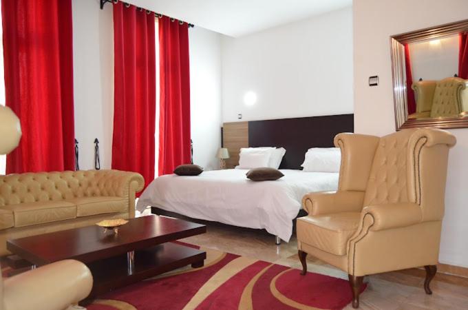 Postel nebo postele na pokoji v ubytování Hotel D'orient