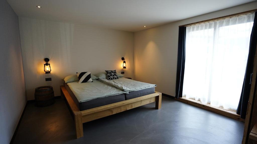 Postel nebo postele na pokoji v ubytování Chalet Charbon