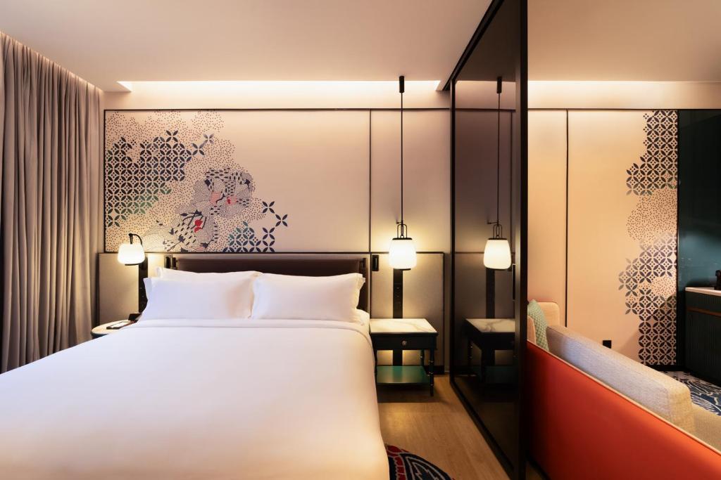 Iconic Marjorie Hotel, Penang, a Tribute Portfolio Hotel客房内的一张或多张床位