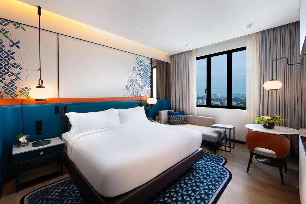 Iconic Marjorie Hotel, Penang, a Tribute Portfolio Hotel客房内的一张或多张床位