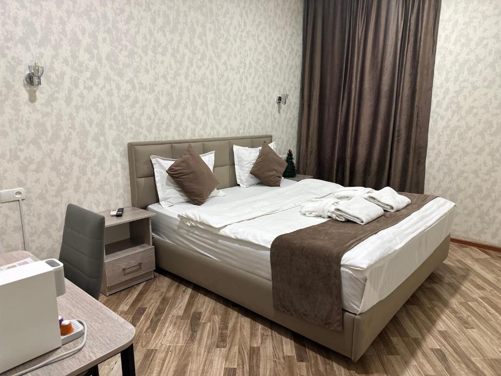 Postel nebo postele na pokoji v ubytování Big Star Hotel