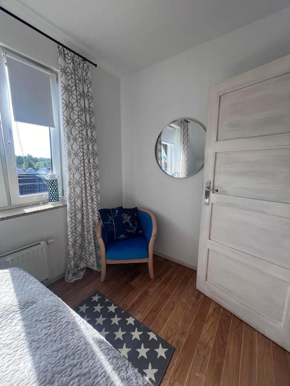 Posteľ alebo postele v izbe v ubytovaní Apartament Przy Klifach