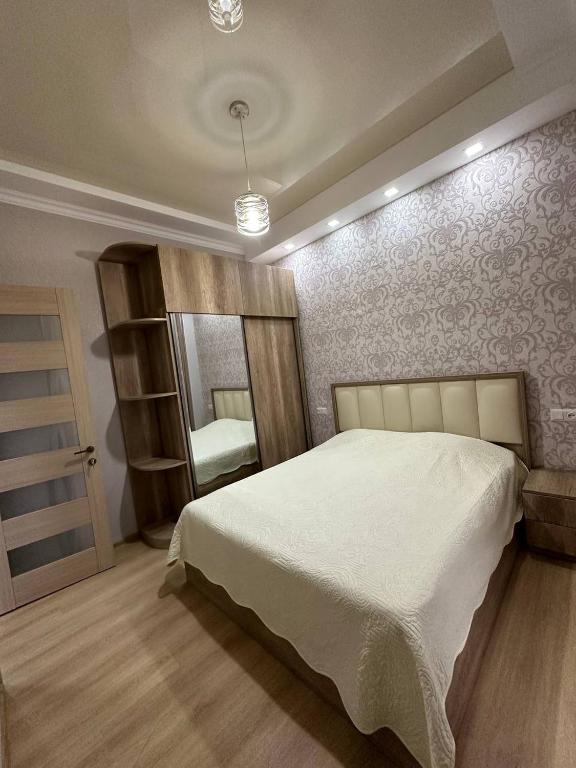 Postel nebo postele na pokoji v ubytování Marika apartment