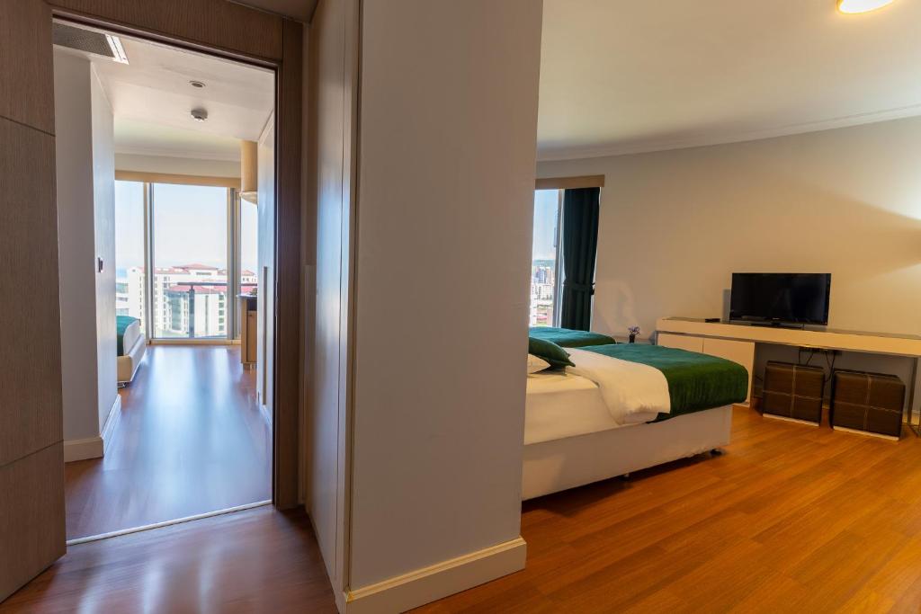 Postel nebo postele na pokoji v ubytování Konak Park Otel Yomra