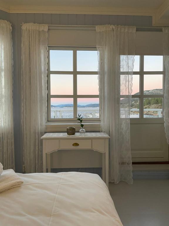 Postel nebo postele na pokoji v ubytování Badehotellet