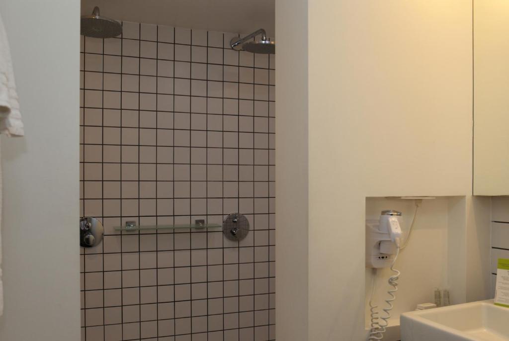Koupelna v ubytování Hotel Esperance
