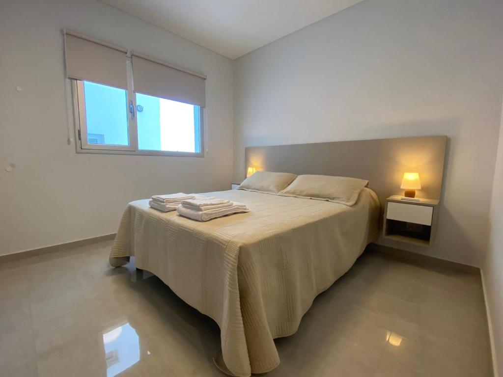 Letto o letti in una camera di Caleta VIEW - Alojamientos