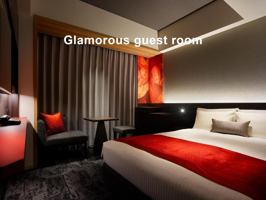 Postel nebo postele na pokoji v ubytování Mitsui Garden Hotel Ginza-gochome