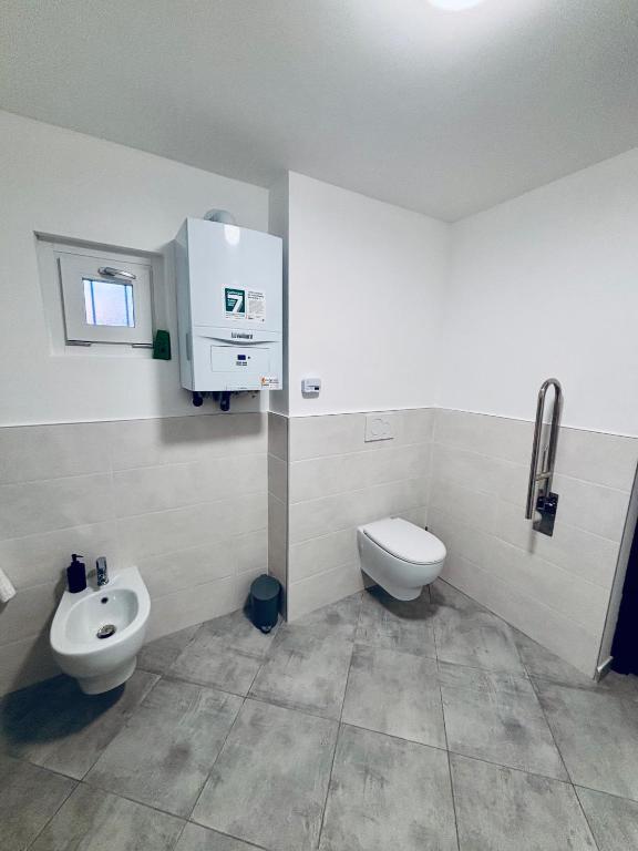 Koupelna v ubytování Hd Guesthouse Oasi urbana con parcheggio privato gratuito, fronte stazione