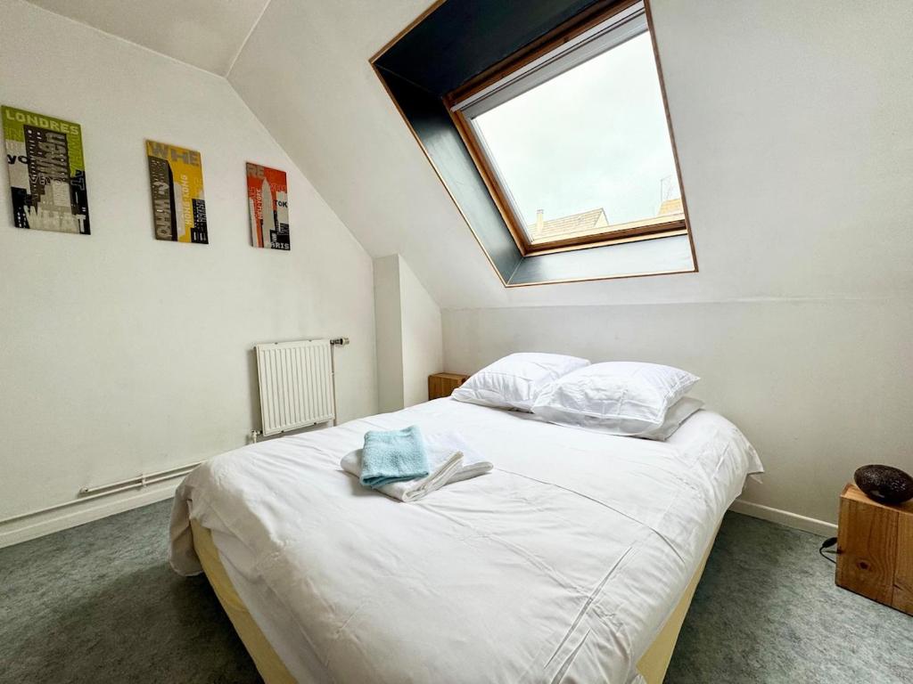 Postel nebo postele na pokoji v ubytování LEscaleVintage- Balneo - Jardin - Proche mer