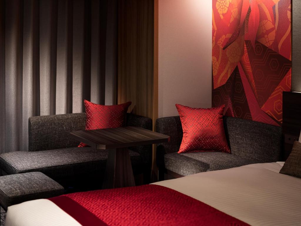 Postel nebo postele na pokoji v ubytování Mitsui Garden Hotel Ginza-gochome