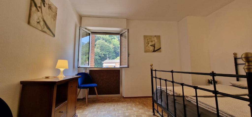 Postel nebo postele na pokoji v ubytování Melide Apartments Lake Lugano close to Swissminiatur & Private Parking on Request