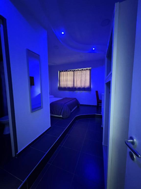 Postel nebo postele na pokoji v ubytování Hotel Le Pinede Relax