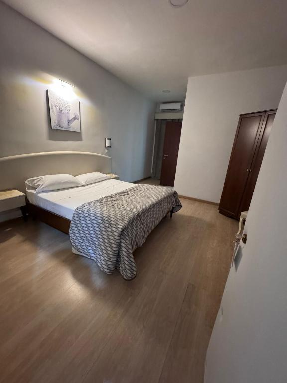 Postel nebo postele na pokoji v ubytování Hotel Le Pinede Relax