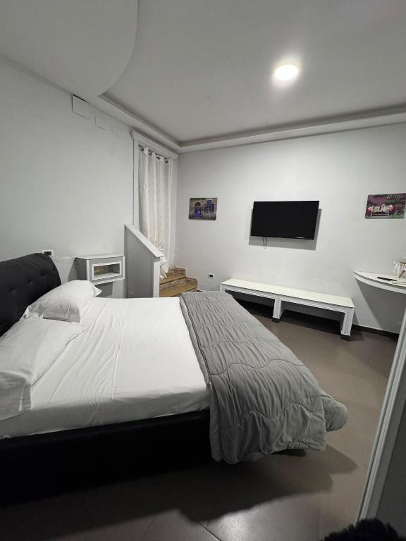 Postel nebo postele na pokoji v ubytování Hotel Le Pinede Relax