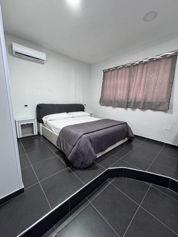 Postel nebo postele na pokoji v ubytování Hotel Le Pinede Relax
