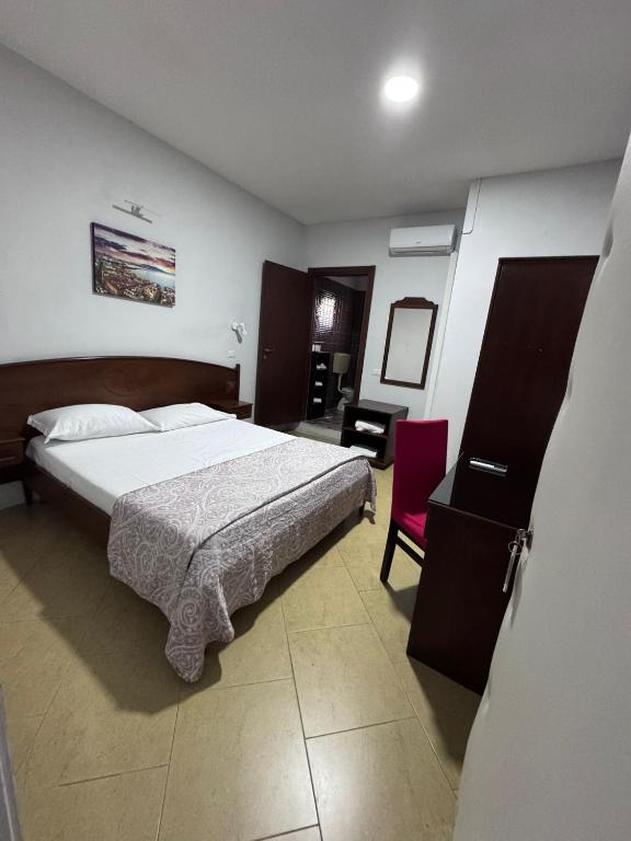 Postel nebo postele na pokoji v ubytování Hotel Le Pinede Relax