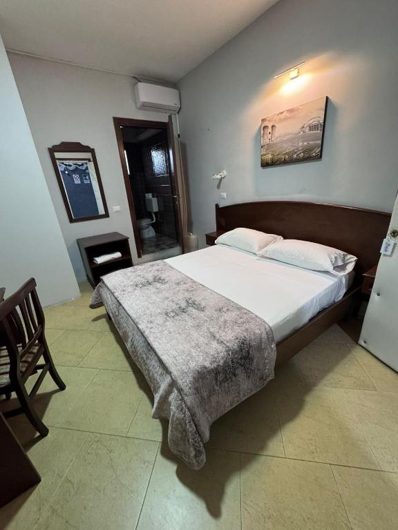 Postel nebo postele na pokoji v ubytování Hotel Le Pinede Relax