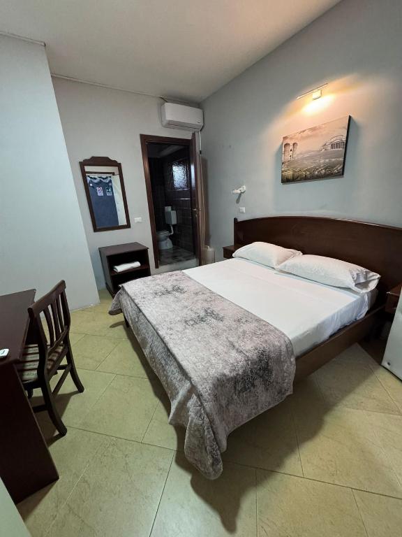 Postel nebo postele na pokoji v ubytování Hotel Le Pinede Relax