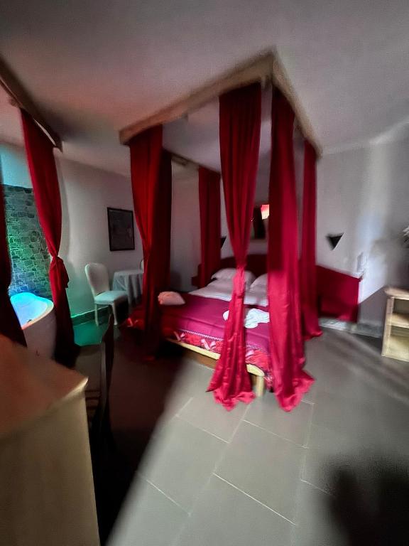 Postel nebo postele na pokoji v ubytování Hotel Le Pinede Relax