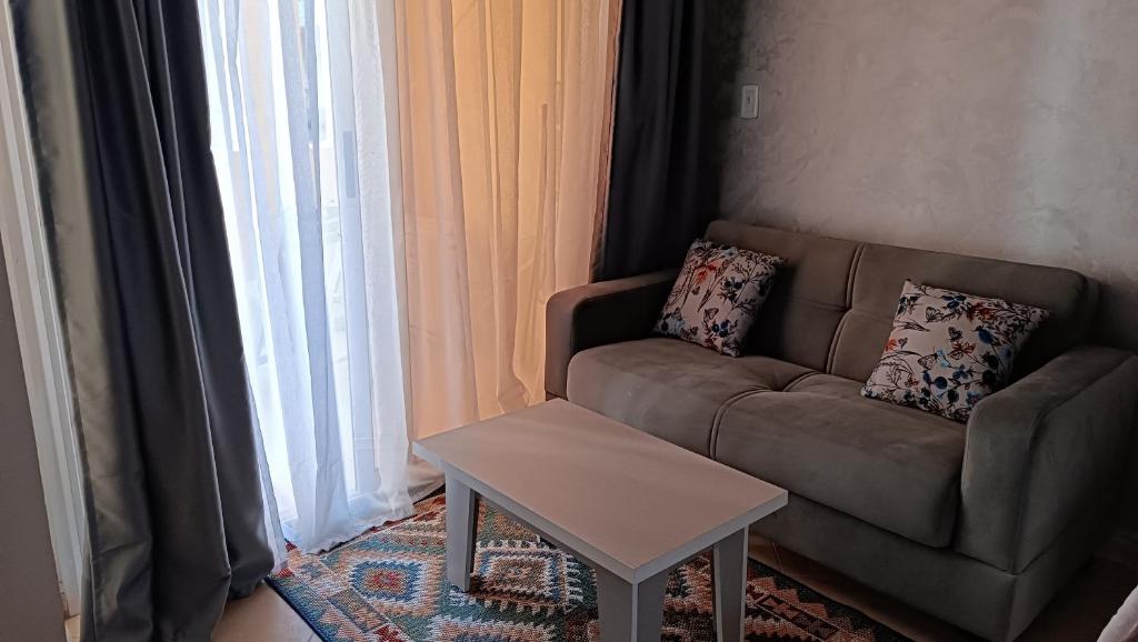 Posezení v ubytování Cozy studio Florenza Khamsin