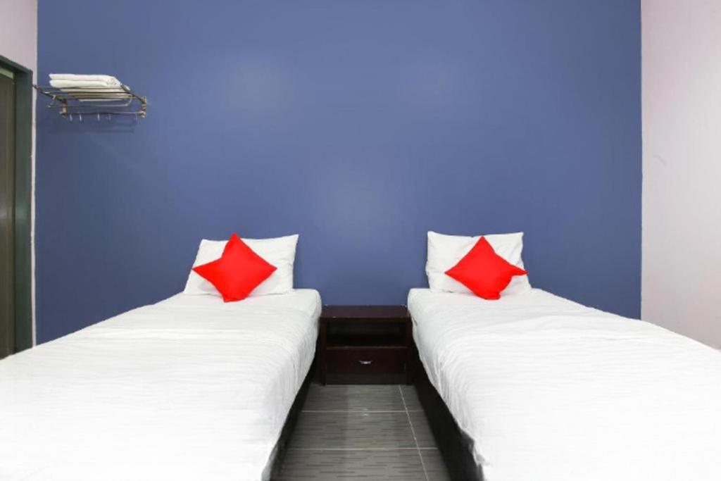 Postel nebo postele na pokoji v ubytování De Hotel