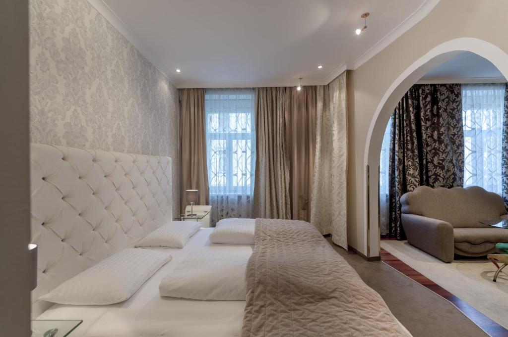 Postel nebo postele na pokoji v ubytování Altstadthotel Wolf-Dietrich