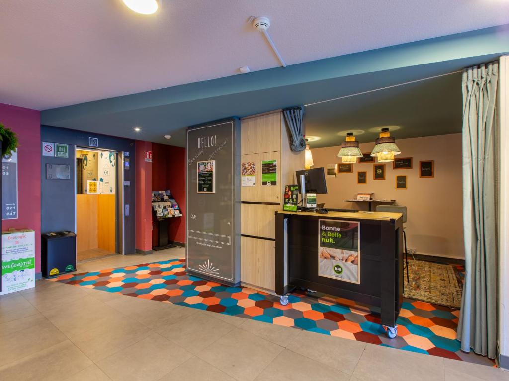 Kuchyň nebo kuchyňský kout v ubytování B&B HOTEL Orléans Nord Saran