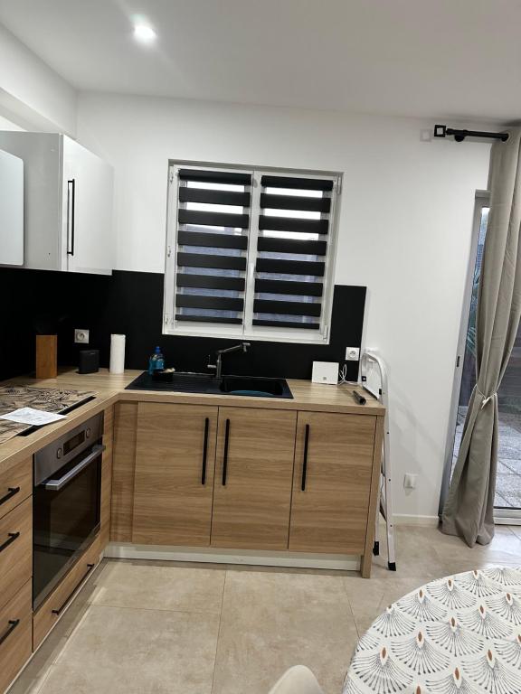 Charmante maison - Two-Bedroom Apartment