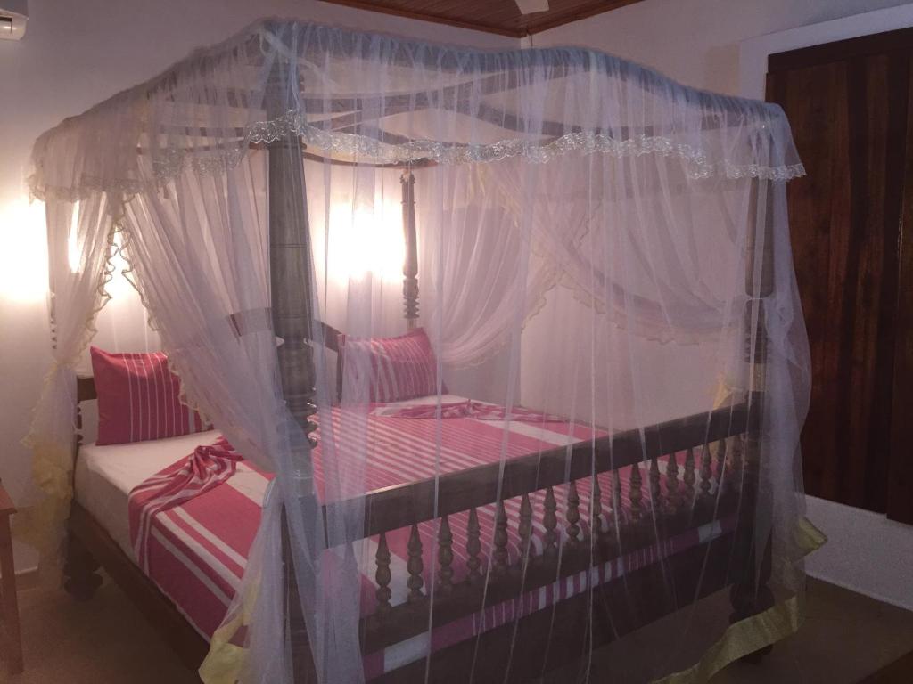 Postel nebo postele na pokoji v ubytování New Imperial Hotel