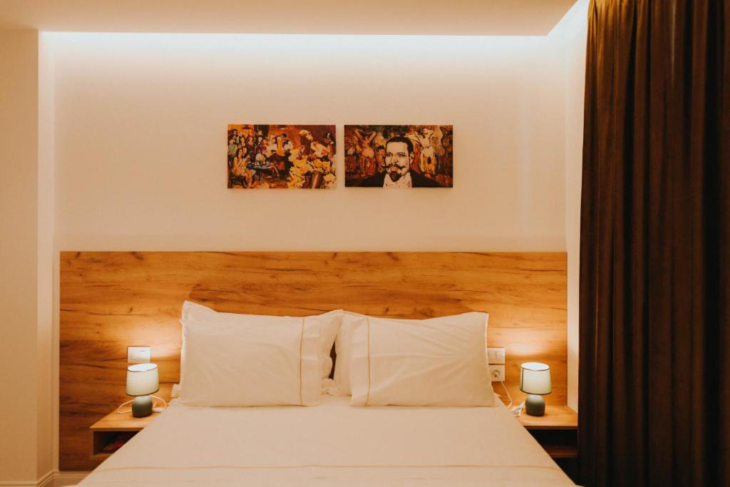 Postel nebo postele na pokoji v ubytování Hotel Delicia