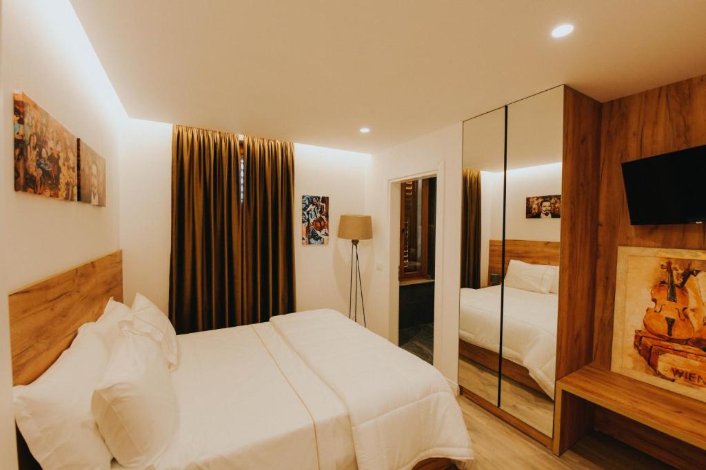 Postel nebo postele na pokoji v ubytování Hotel Delicia