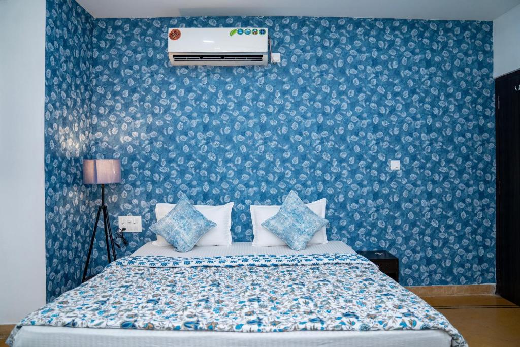 Ένα ή περισσότερα κρεβάτια σε δωμάτιο στο Footprint Hostel Udaipur