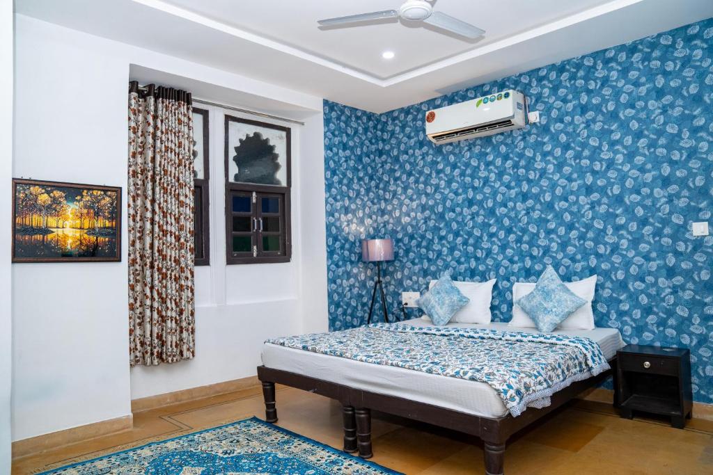 Ένα ή περισσότερα κρεβάτια σε δωμάτιο στο Footprint Hostel Udaipur
