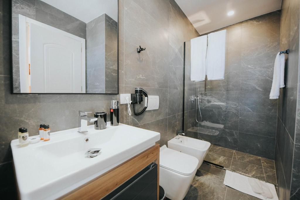 Koupelna v ubytování Hotel Delicia