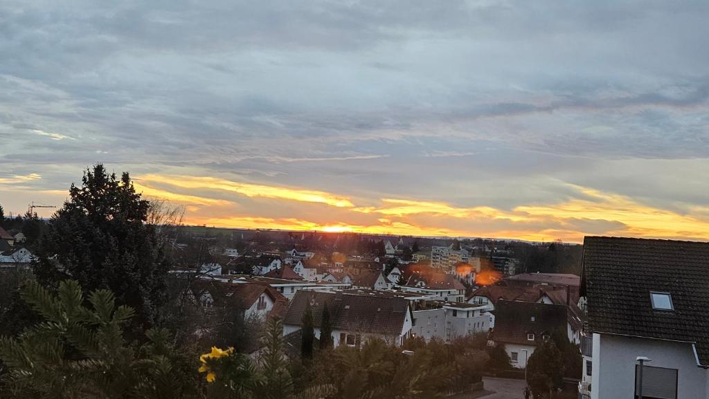 a view of a city at sunset at Ferienwohnung Bad Bergzabern in Bad Bergzabern
