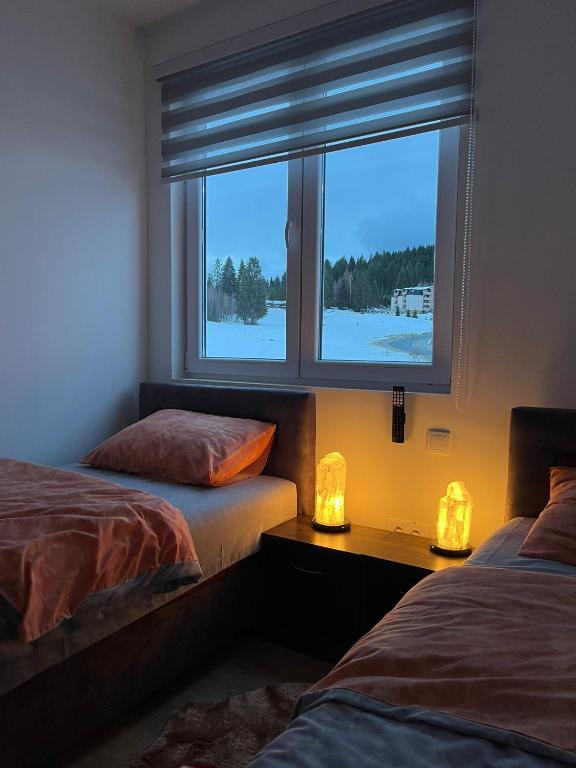 Postel nebo postele na pokoji v ubytování Apartman Zlatar-Vasiljevic