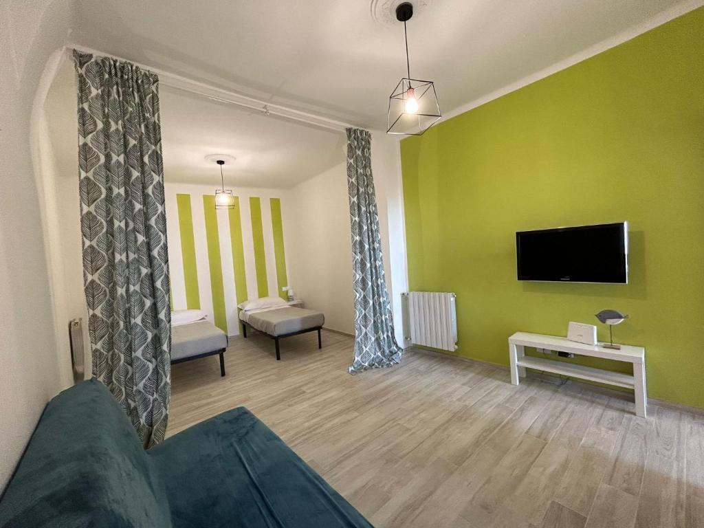 Телевизор и/или развлекательный центр в Casa Vacanze Merletto
