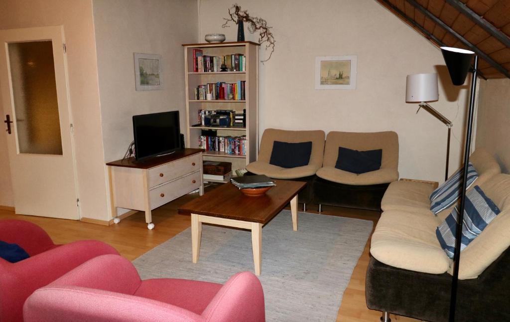 TV a/nebo společenská místnost v ubytování Vakantiehuis Reuzengebergte