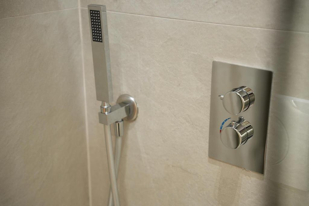 Koupelna v ubytování NEA Deluxe Apart-Hotel