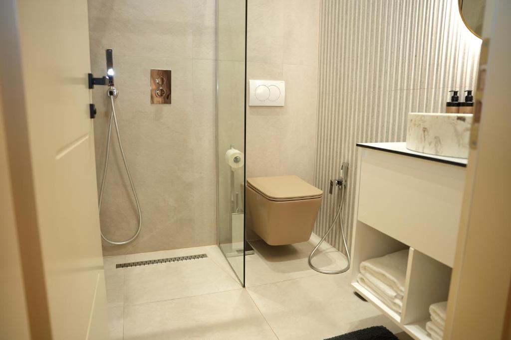 Koupelna v ubytování NEA Deluxe Apart-Hotel