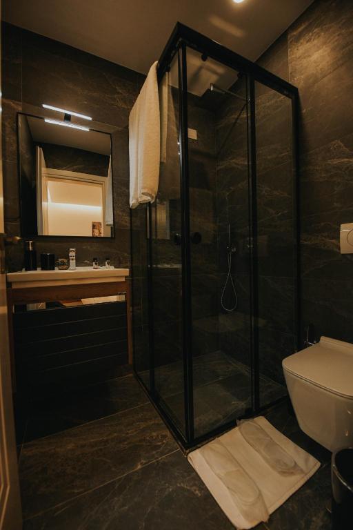 Koupelna v ubytování Hotel Delicia