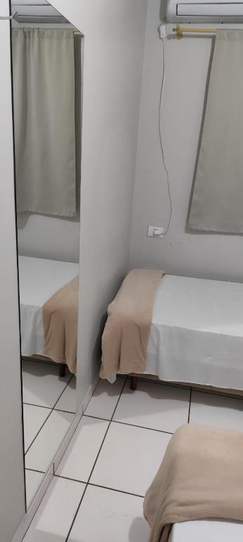 Postel nebo postele na pokoji v ubytování Hotel Andorinha