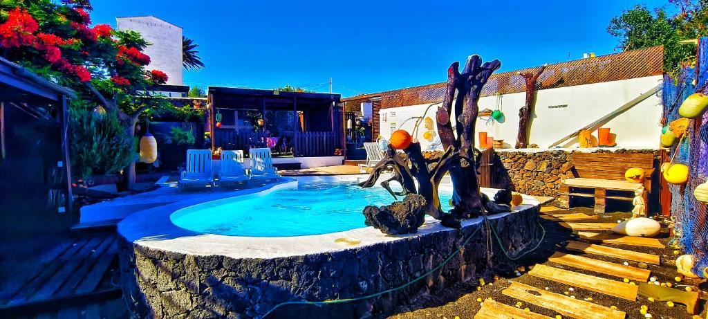 Swimmingpoolen hos eller tæt på Finca Lucía - El Pequeño Edén