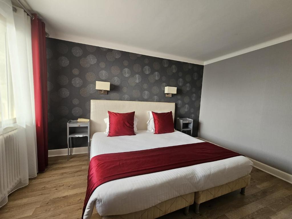 Postel nebo postele na pokoji v ubytování La Côte Bleue