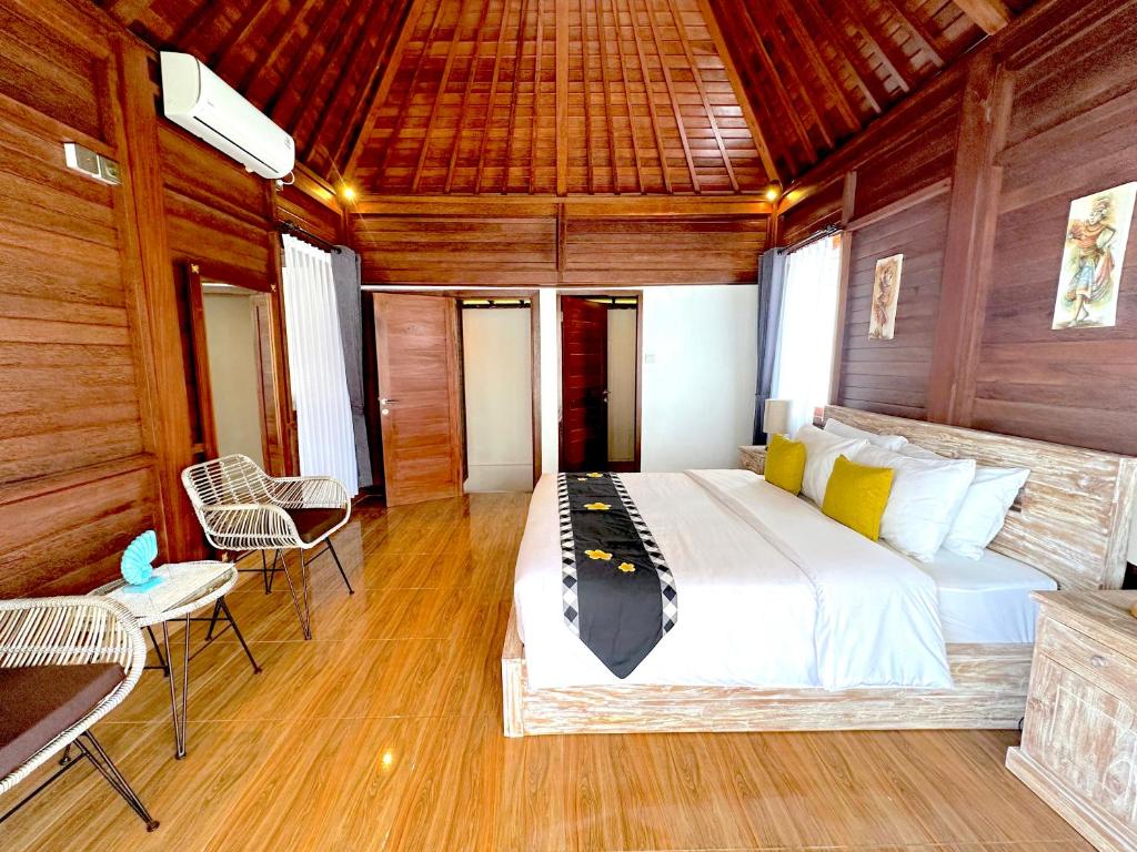 Postel nebo postele na pokoji v ubytování Panji Hill Residence