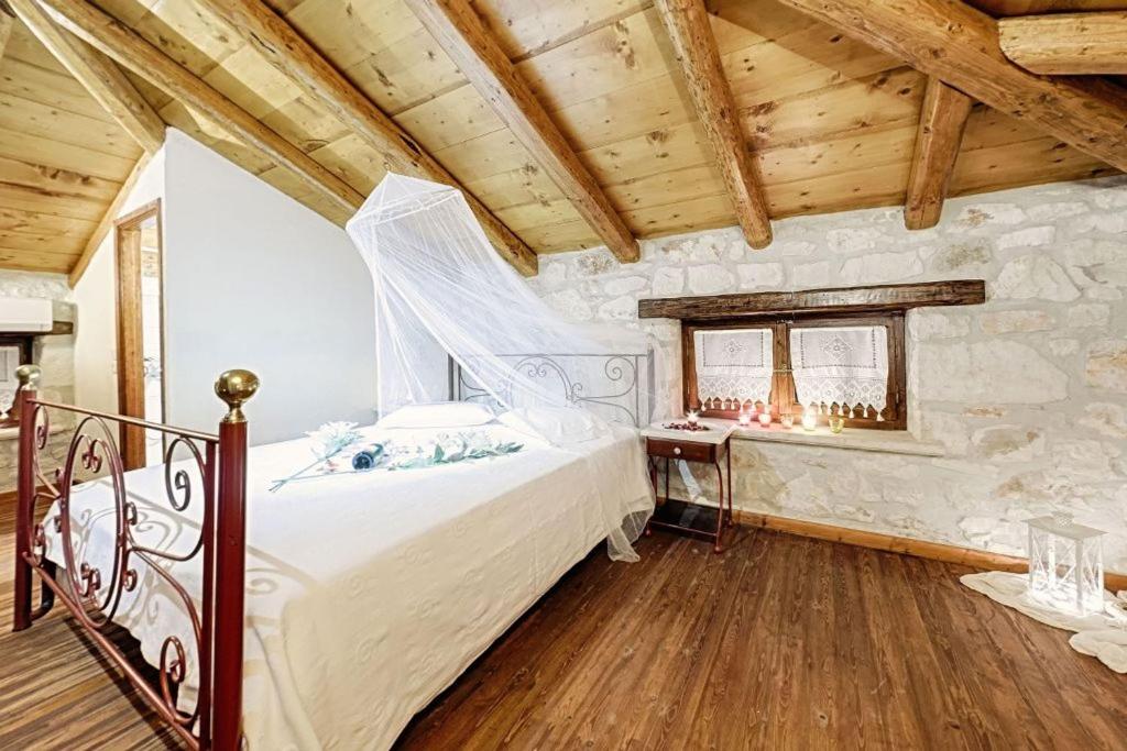 Posteľ alebo postele v izbe v ubytovaní Villa Poseidon Residence