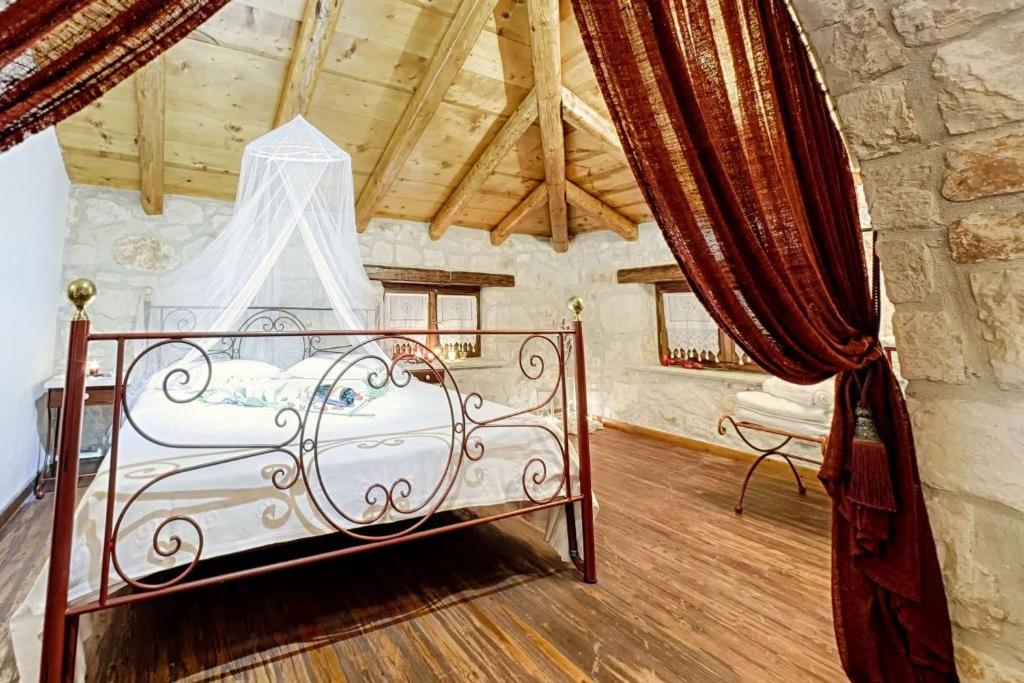 Posteľ alebo postele v izbe v ubytovaní Villa Poseidon Residence